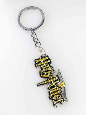 Ігровий металевий брелок Harry Potter — логотип Hogwarts з крилом