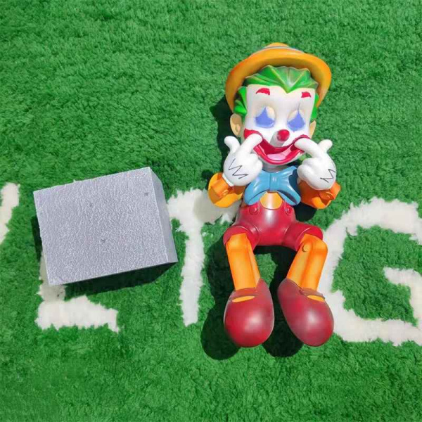 Фигурка Kaws Пиноккио Джокер (30 см) Фигурка Kaws Пиноккио Джокер (30 см)