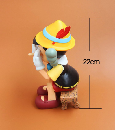 Kaws Pinocchio & Jiminy Cricket Фігурка Піноккіо Сидячий (Дісней) - 22 см