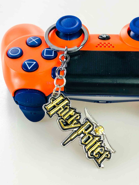 Ігровий металевий брелок Harry Potter — логотип Hogwarts з крилом