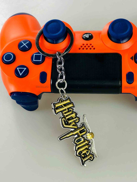 Ігровий металевий брелок Harry Potter — логотип Hogwarts з крилом